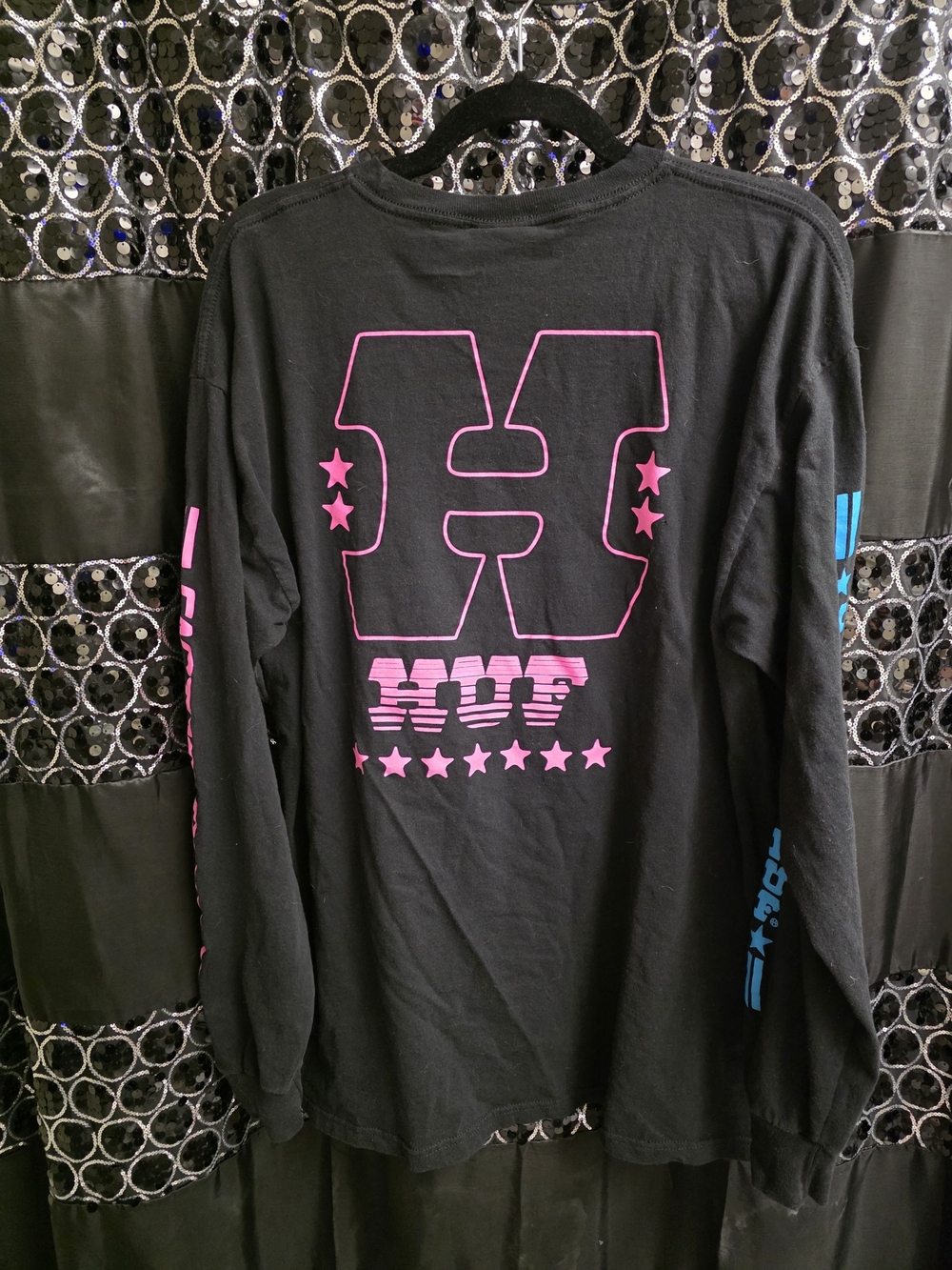 HUF Black Long Sleeve Tee with Pink Graphic and Blue Sleeve Accents